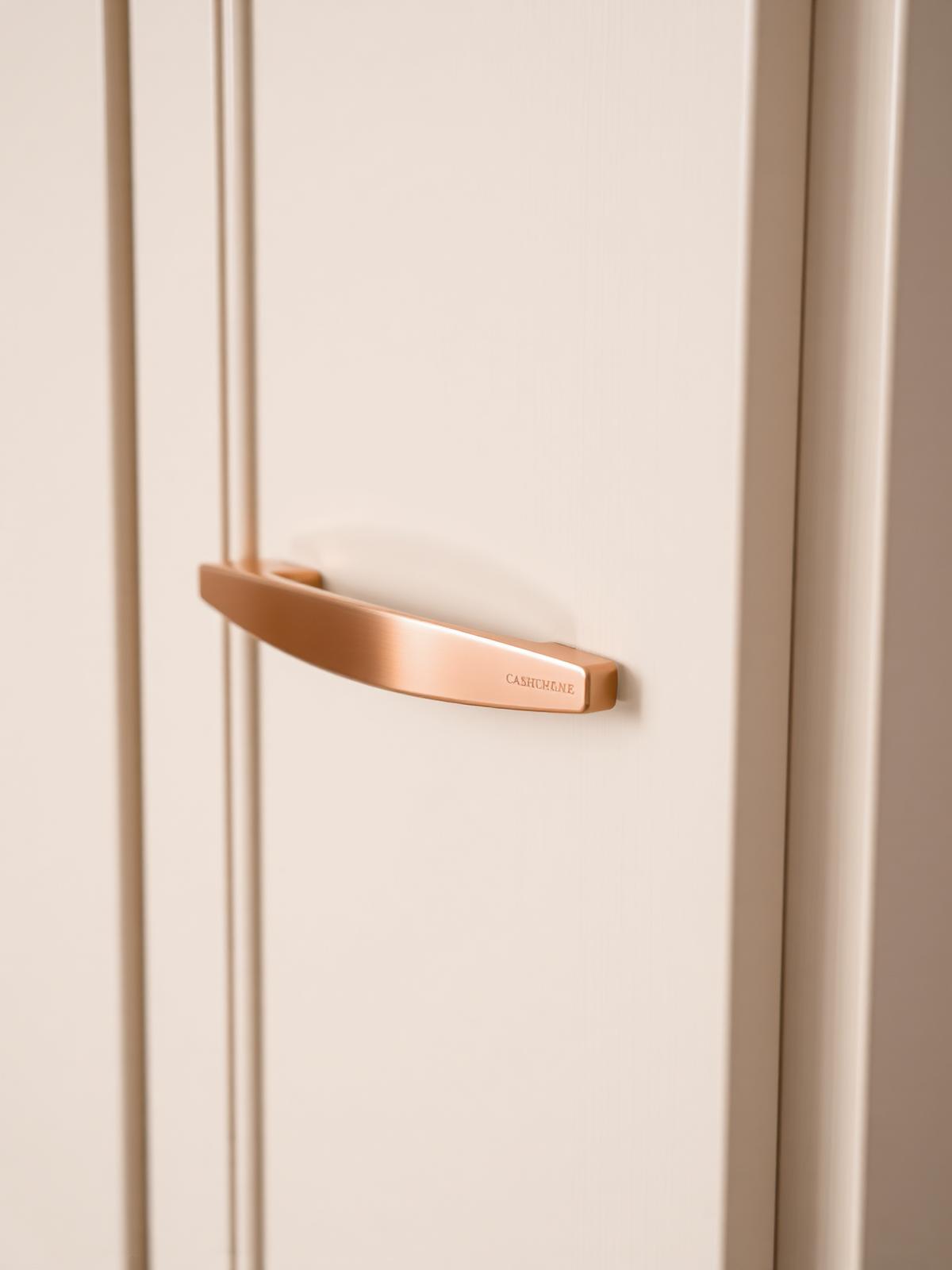 Cashmere sprayed kitchen door with rose gold handle
